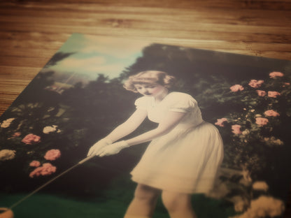 Whimsical Vintage Girl Playing Golf with Easter Eggs Art Print Poster for Dreamcore Nursery, Soft Academia, Pastel Cottagecore Wall Decor